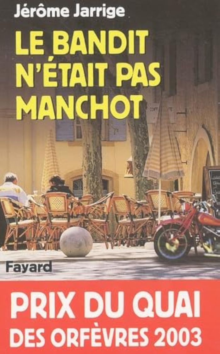 Couverture du livre « LE BANDIT N'ETAIT PAS MANCHOT - PRIX DU QUAI DES ORFEVRES 2003 », librairie Les Contes Infusés à Corte