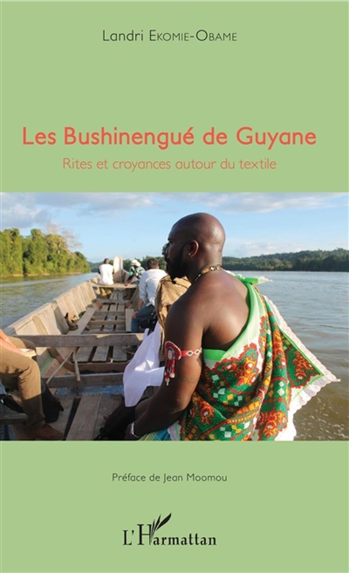 Couverture du livre « LES BUSHINENGUE DE GUYANE - RITES ET CROYANCES AUTOUR DU TEXTILE » de Landri Ekomie-Obame, librairie Les Contes Infusés à Corte