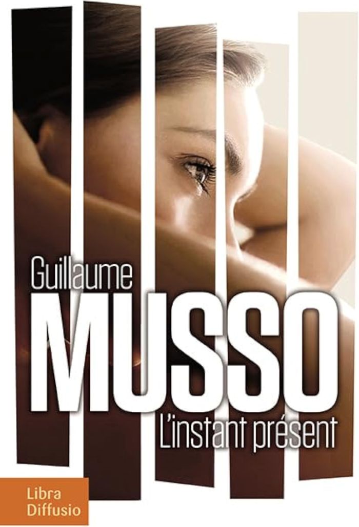 Couverture du livre « L'instant présent : roman » de Guillaume Musso, librairie Les Contes Infusés à Corte