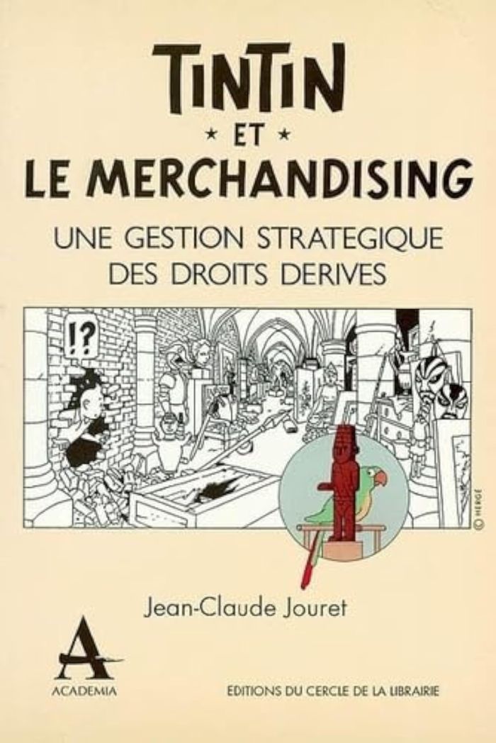 Couverture du livre « TINTIN ET LE MARCHANDISING UNE GESTION STRATEGIQUE DES DROIT S DERIVES » de Jean-Claude Jouret, librairie Les Contes Infusés à Corte